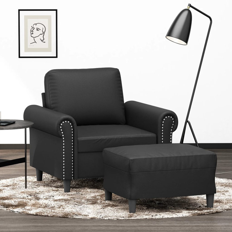 Black chair with cheap footstool